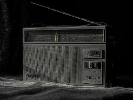 a black and white photo of an old radio