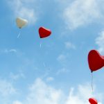 red and white heart balloons